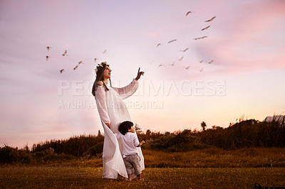 Buy stock photo Shot of a young mother and her son outdoors