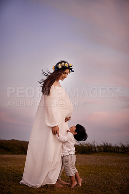 Buy stock photo Shot of a young mother and her son outdoors