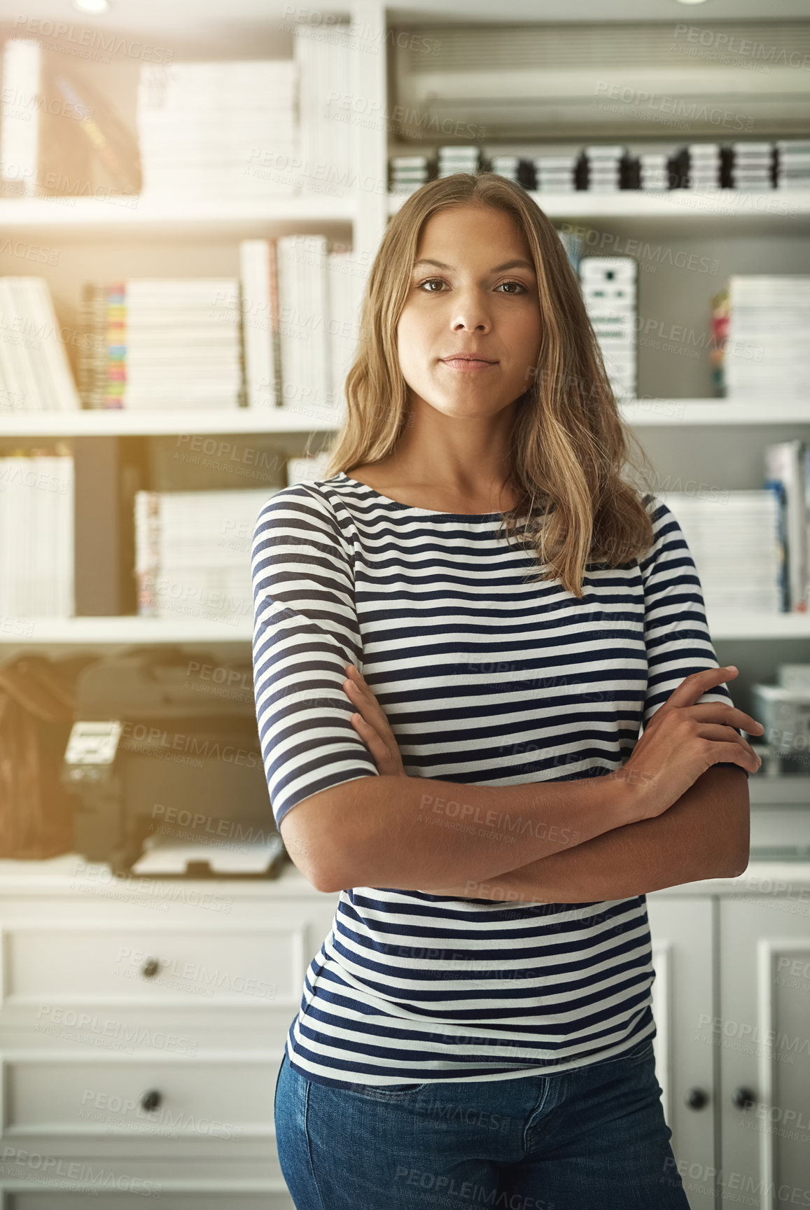 Buy stock photo Woman, portrait and publisher in home office, arms crossed and bookshelf for editing fiction. Female person, story writer and proud of novel collection, confident and independent startup company