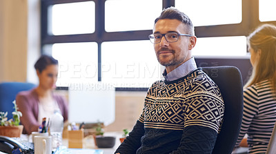 Buy stock photo Cropped portrait of a mature businessman sitting in his office and holding his hands together and looking at the camera