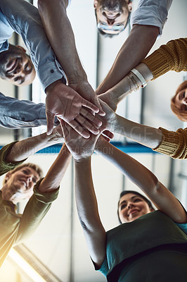 Buy stock photo Winning, celebrating and successful business people stack hands in the office for team building. Group of employees in agreement on unity, help and support together at the workplace