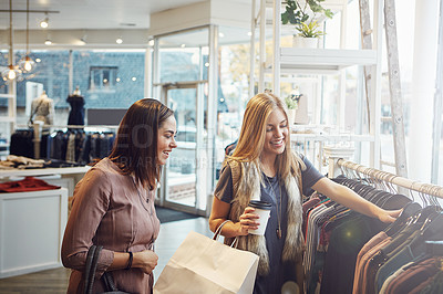 Buy stock photo Shot of two girlfriends out on a shopping spree together
