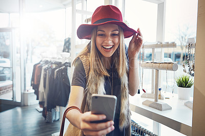 Buy stock photo Selfie, shopping and woman with hat in mall with discount, sale or deal in luxury boutique. Fashion, smile and female influencer with designer accessory for photography picture at store in New York.