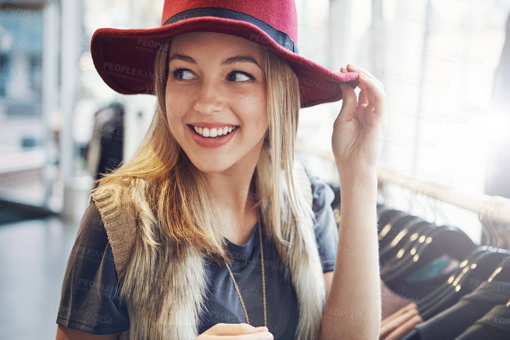 Buy stock photo Cropped shot of an attractive young woman out on a shopping spree