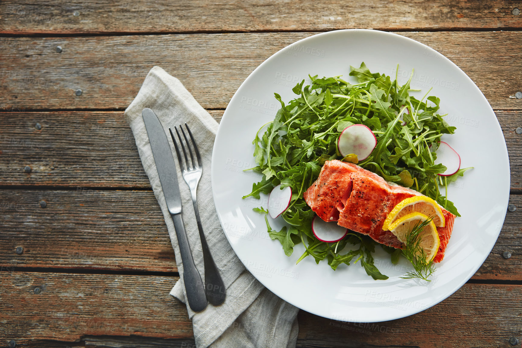 Buy stock photo Food, fish protein and salad on table with nutrition, lunch and lose weight with pescatarian diet. Salmon, rocket leaves and dinner plate above with cholesterol for gut health and digestion benefits