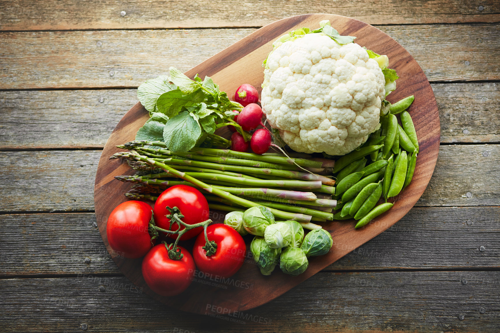 Buy stock photo Above, desk and vegetables on wood board for cooking with diet, nutrition and healthy soup. Fresh, food and home with organic or vegetarian meal for wellness, wellbeing and self care and vegan