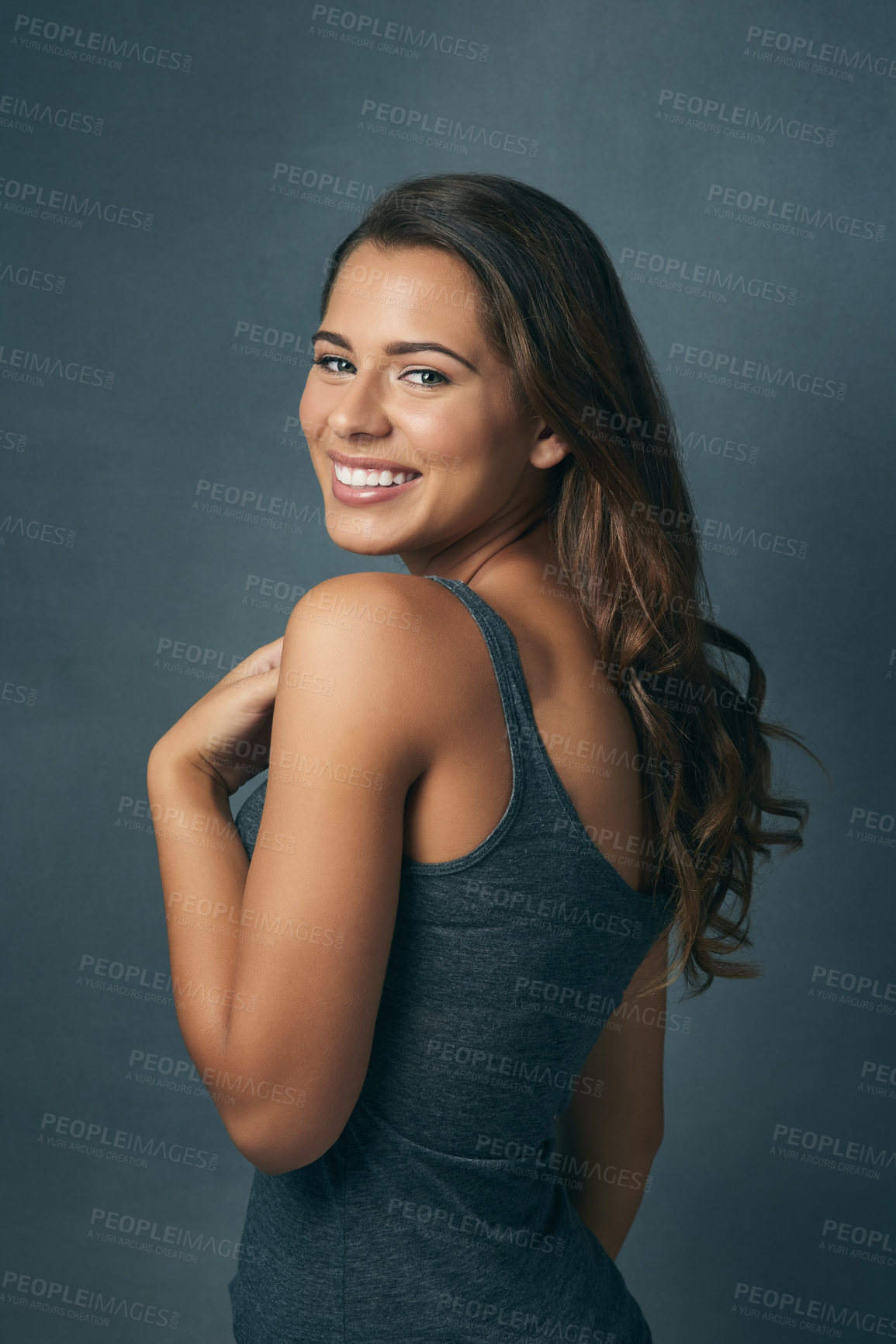 Buy stock photo Happy, hair and portrait of woman in studio with healthy texture for wellness, salon and growth. Haircare, attractive and face of isolated person with confidence, beauty and pride on gray background