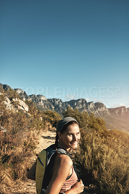 Buy stock photo Portrait of a young woman out on a hike through the mountains