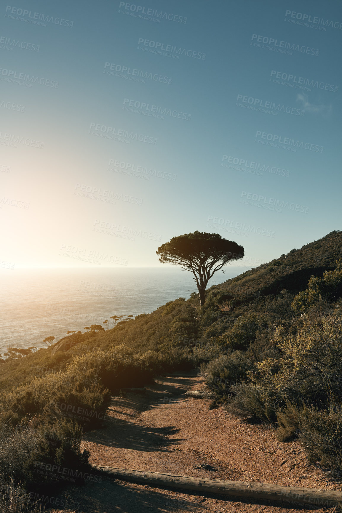 Buy stock photo Shot of a beautiful view along the coast from the top of a mountain