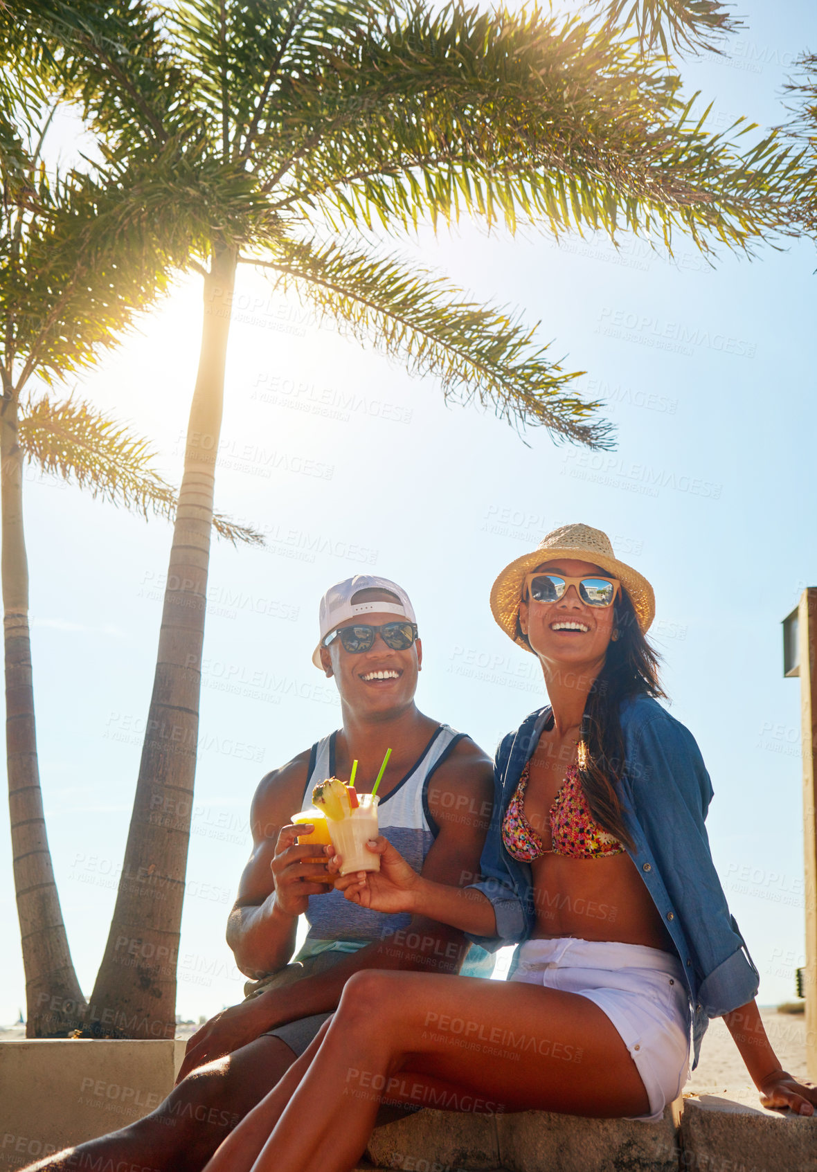 Buy stock photo Cropped shot of an affectionate young couple spending a summer’s day outdoors