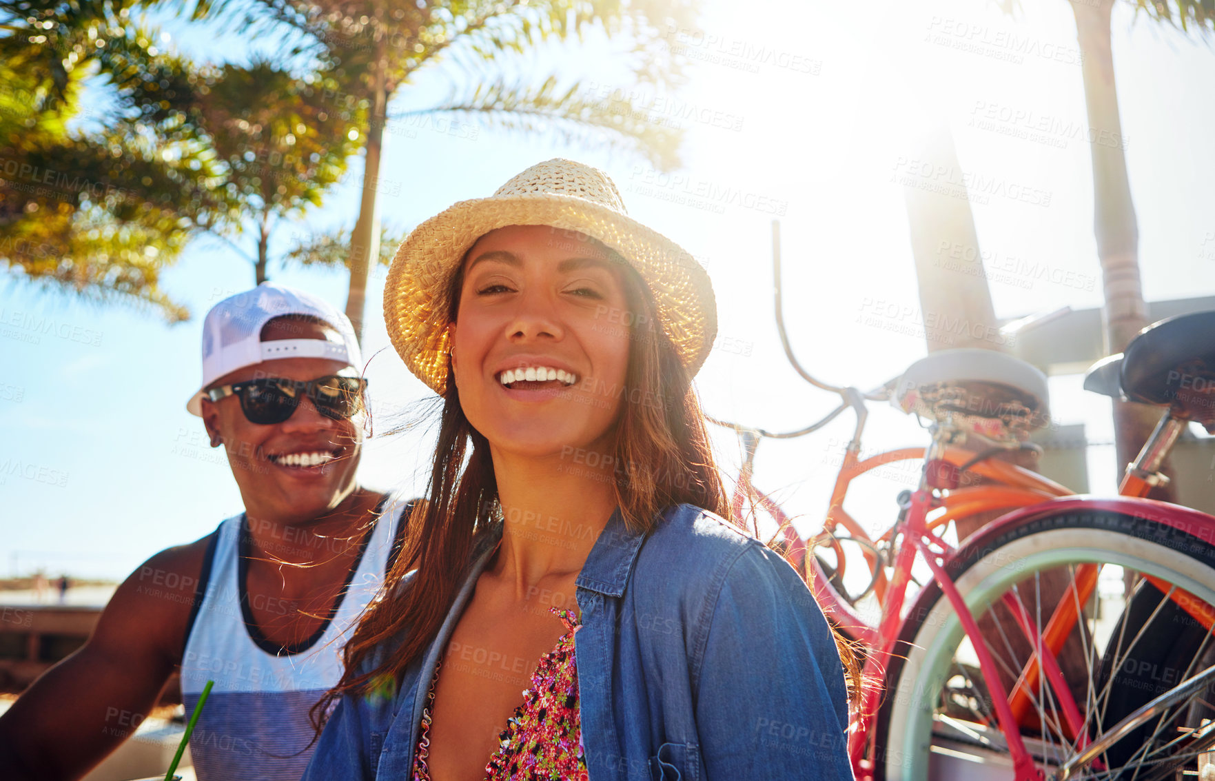 Buy stock photo Cropped portrait of an affectionate young couple spending a summer’s day outdoors