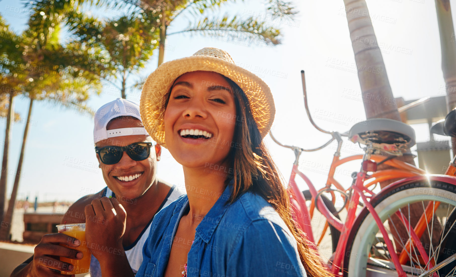 Buy stock photo Cropped portrait of an affectionate young couple spending a summer’s day outdoors