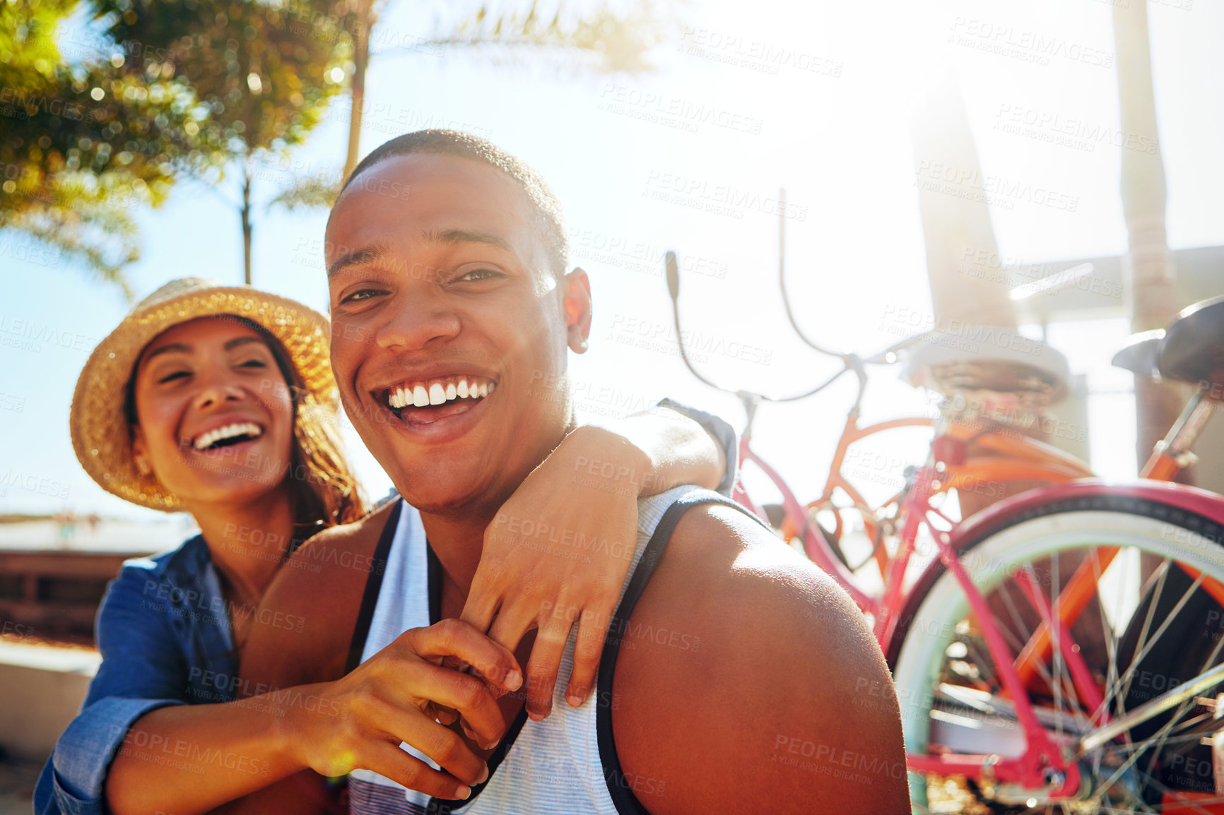 Buy stock photo Cropped shot of an affectionate young couple spending a summer’s day outdoors