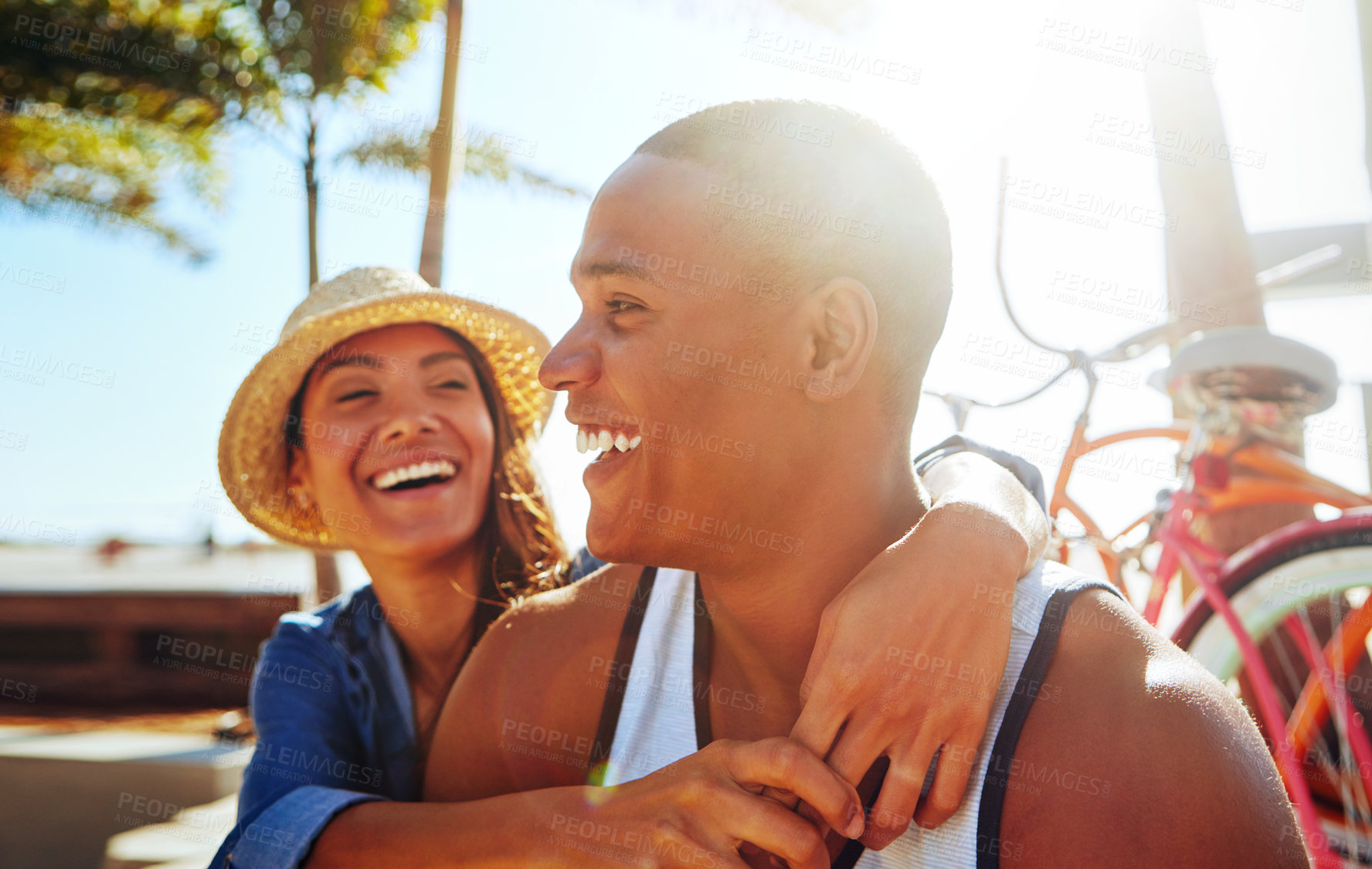 Buy stock photo Cropped shot of an affectionate young couple spending a summer’s day outdoors