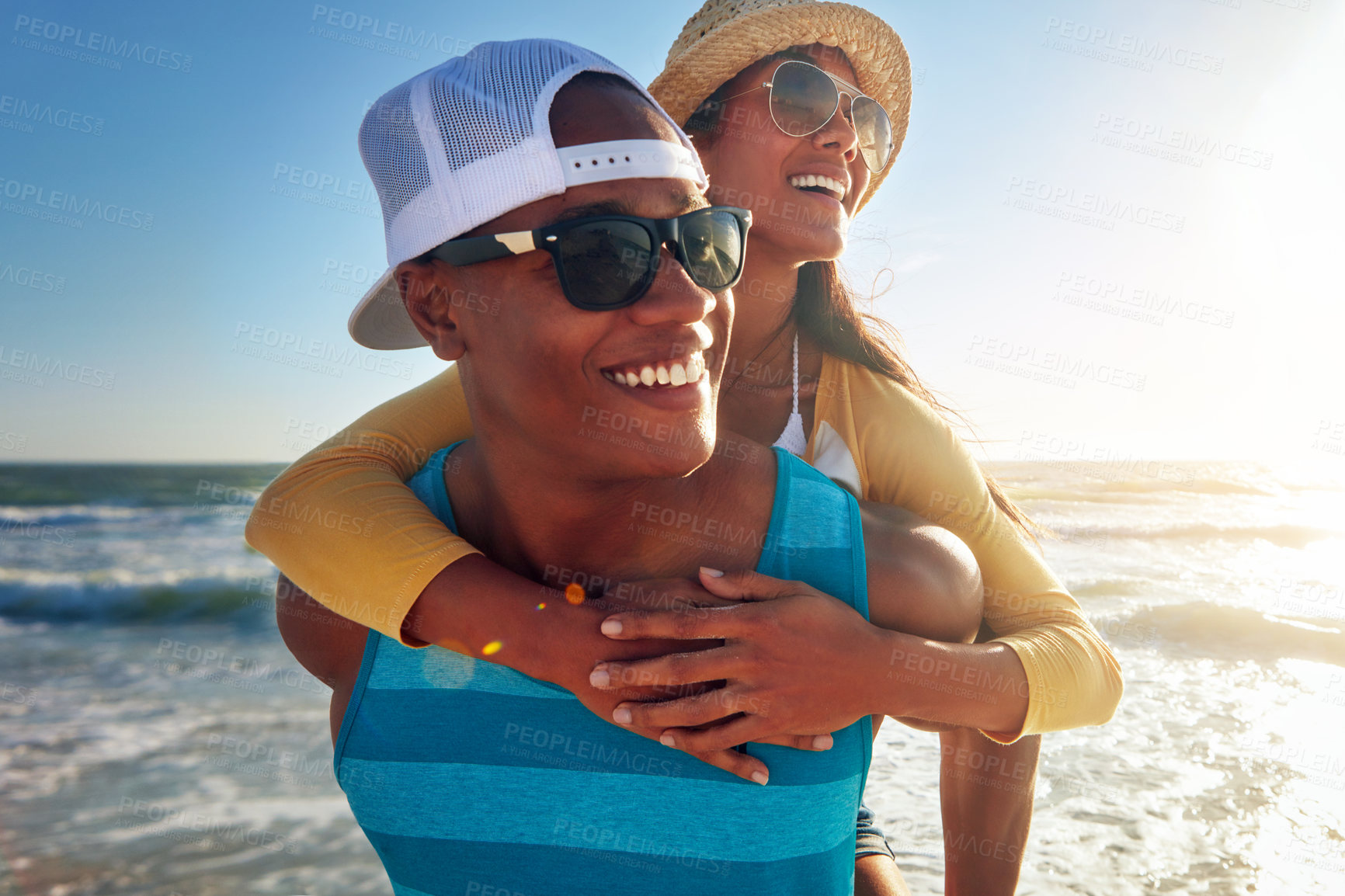 Buy stock photo Man, woman or beach holiday with piggy back, smile with support on vacation on tropical island. Happy couple, together or sunglasses by ocean for travel with wellness, sea or waves in Mauritius