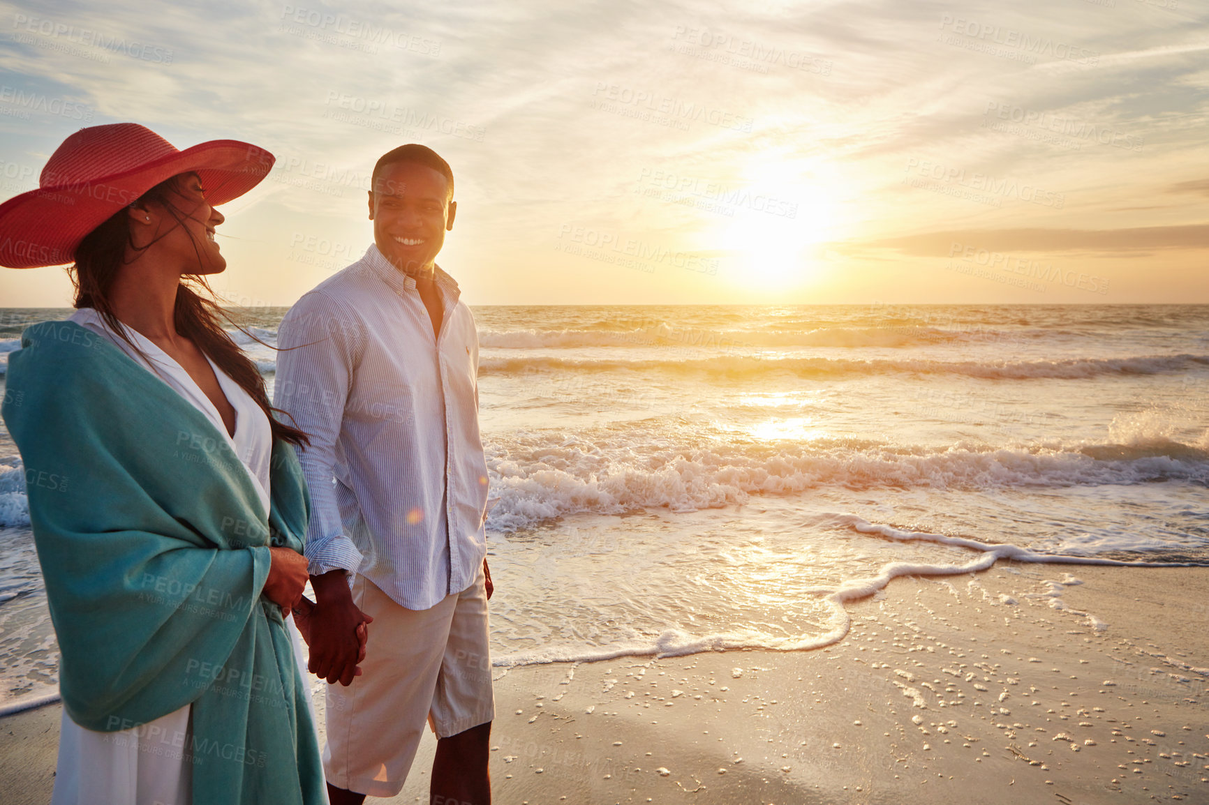 Buy stock photo Couple, ocean and holding hands in sunset with love for summer holiday, vacation or travel. Happy people walking and talk of anniversary or valentines day by beach waves for romance with mockup space