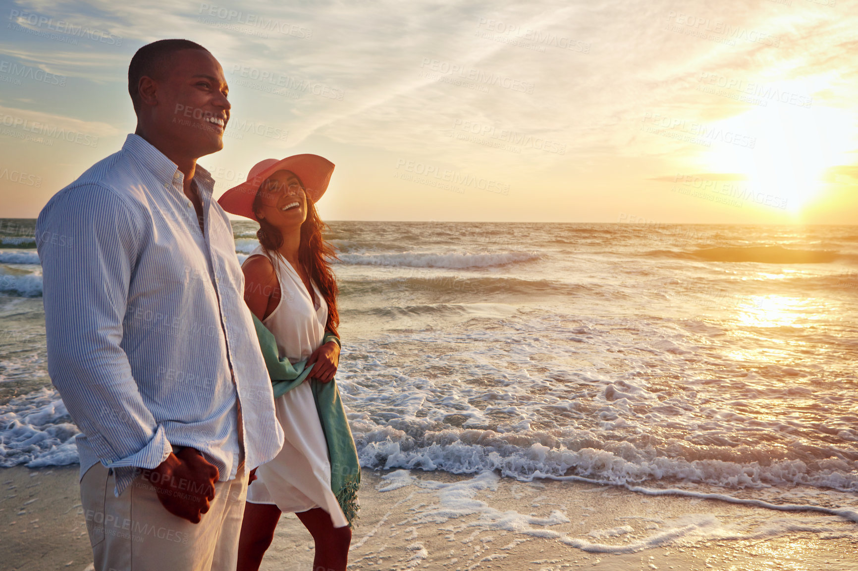 Buy stock photo Couple, laughing and walking on sunset beach with love for summer holiday, vacation and travel together. Young people talking and excited for anniversary or valentines day and romance in waves mockup