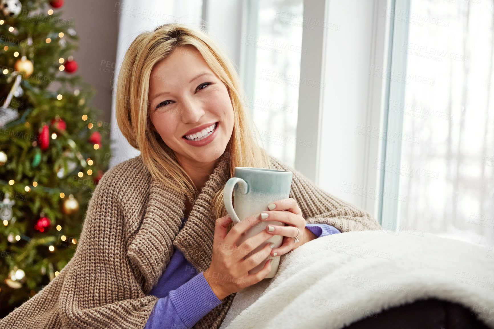 Buy stock photo Christmas, happy woman and coffee on home sofa with smile while thinking of memory. Portrait of lady with hot chocolate or tea cup to relax for festive holiday, season or winter vacation celebration