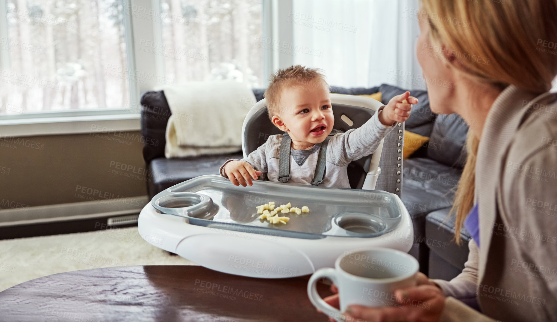 Buy stock photo Shot of a mother bonding with her baby boy at home