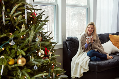 Buy stock photo Christmas, happy woman and tea on house sofa with smile while thinking of memory. Portrait of lady with hot chocolate or coffee cup to relax for festive holiday, season or winter vacation celebration