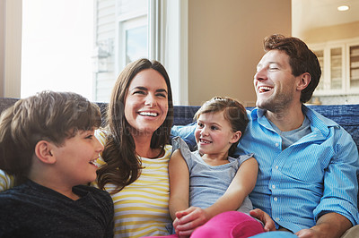 Buy stock photo Shot of a happy family bonding together at home