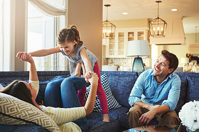 Buy stock photo Airplane, fun and family on sofa in home relaxing with care, happiness and love together. Smile, bonding and girl child with flying and playing with mother and father sitting on couch in house.