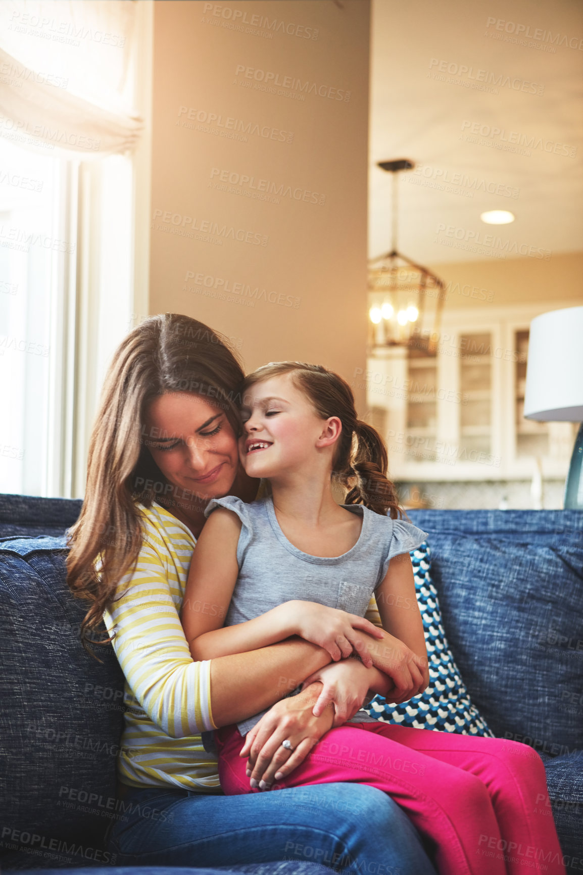 Buy stock photo Love, woman and child for hug on sofa house of trust, bonding and support of relationship moment. Smile, mother and girl as family for care, security or relax with embrace on couch for childhood