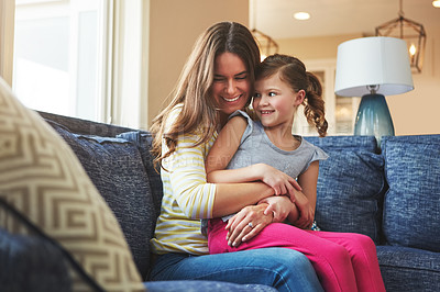 Buy stock photo Love, happy and woman or child hug on sofa for trust, bonding and support of relationship moment. Smile, mother and girl as family for care, security or relax with embrace on couch for childhood