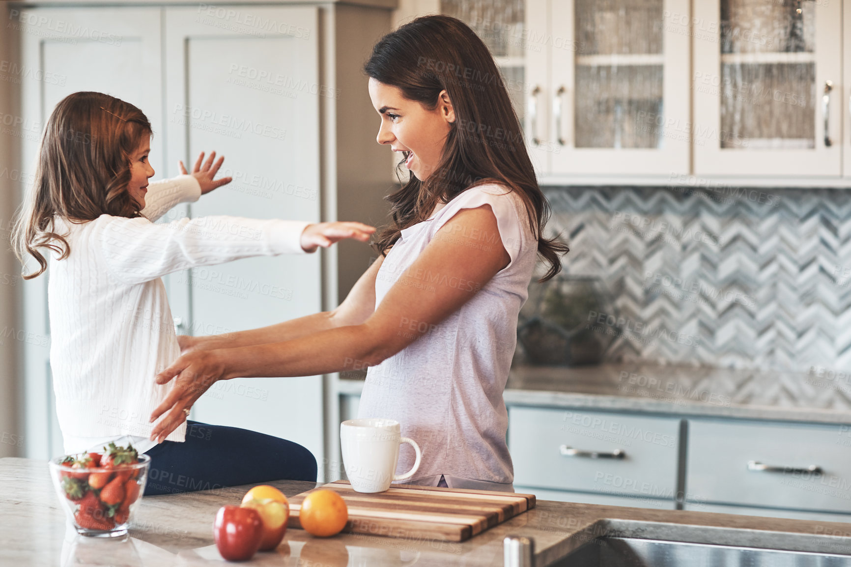 Buy stock photo Counter, mother and hug with girl, kitchen or bonding in weekend, house and kid with smile. Home, child and mom with daughter, embrace and together in morning, peace or happiness in apartment