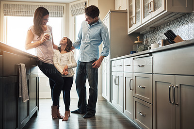 Buy stock photo Parents, girl and love in kitchen for talking, tea and support for relationship in home. Mother and father, daughter and together in embrace for care or security, speaking and bonding in family house