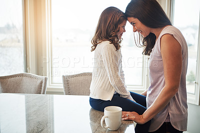 Buy stock photo Together, mom and morning with girl, kitchen counter or woman in weekend, house and kid with love. Bonding, child and mother with daughter, joy or care in apartment, happy or relax with smile