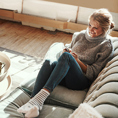 Buy stock photo Phone, house couch and happy woman on the web in a living room calm on a social media scroll. Home sofa, lounge and person relax on a mobile online on wifi with a smile from streaming content