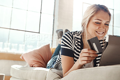 Buy stock photo Online shopping, credit card and woman on tablet happy with online order payment in lounge. Relaxed girl on home sofa checking e commerce transaction for banking card with satisfied smile.