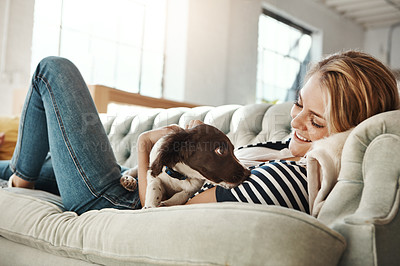 Buy stock photo Dog, couch or happy woman in home to relax on living room sofa in house, lounge or apartment. English spaniel puppy, hug or person resting with love, wellness or support for bonding with pet animal