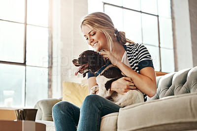 Buy stock photo Woman, dog and calm smile on sofa in living room for animal care, love and support in home. Young female, pet care and relax peace on couch, playful and happiness lifestyle together with therapy dog