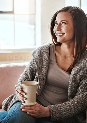 Buy stock photo Happy woman, relax and sofa with coffee for morning, drink or caffeine in living room at home. Young female person or smile or thinking for beverage, cappuccino or latte on lounge couch at house