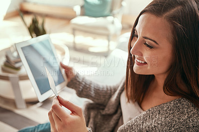 Buy stock photo Credit card, digital tablet and woman on a sofa for ecommerce sale, membership or subscription. Girl debit card and online shopping in a living room, happy and excited for purchase or online order 