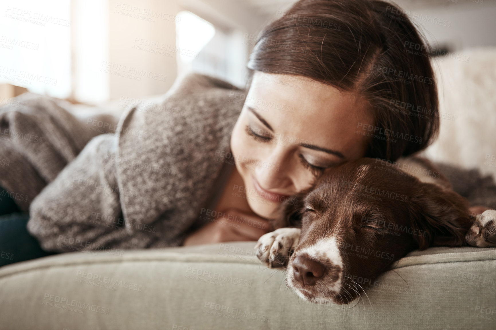 Buy stock photo Love, couch and woman with dog, relax and comfortable in lounge, sleeping and break in weekend and house. Home, girl and animal on sofa, rest and hug for bonding, pet and person in living room