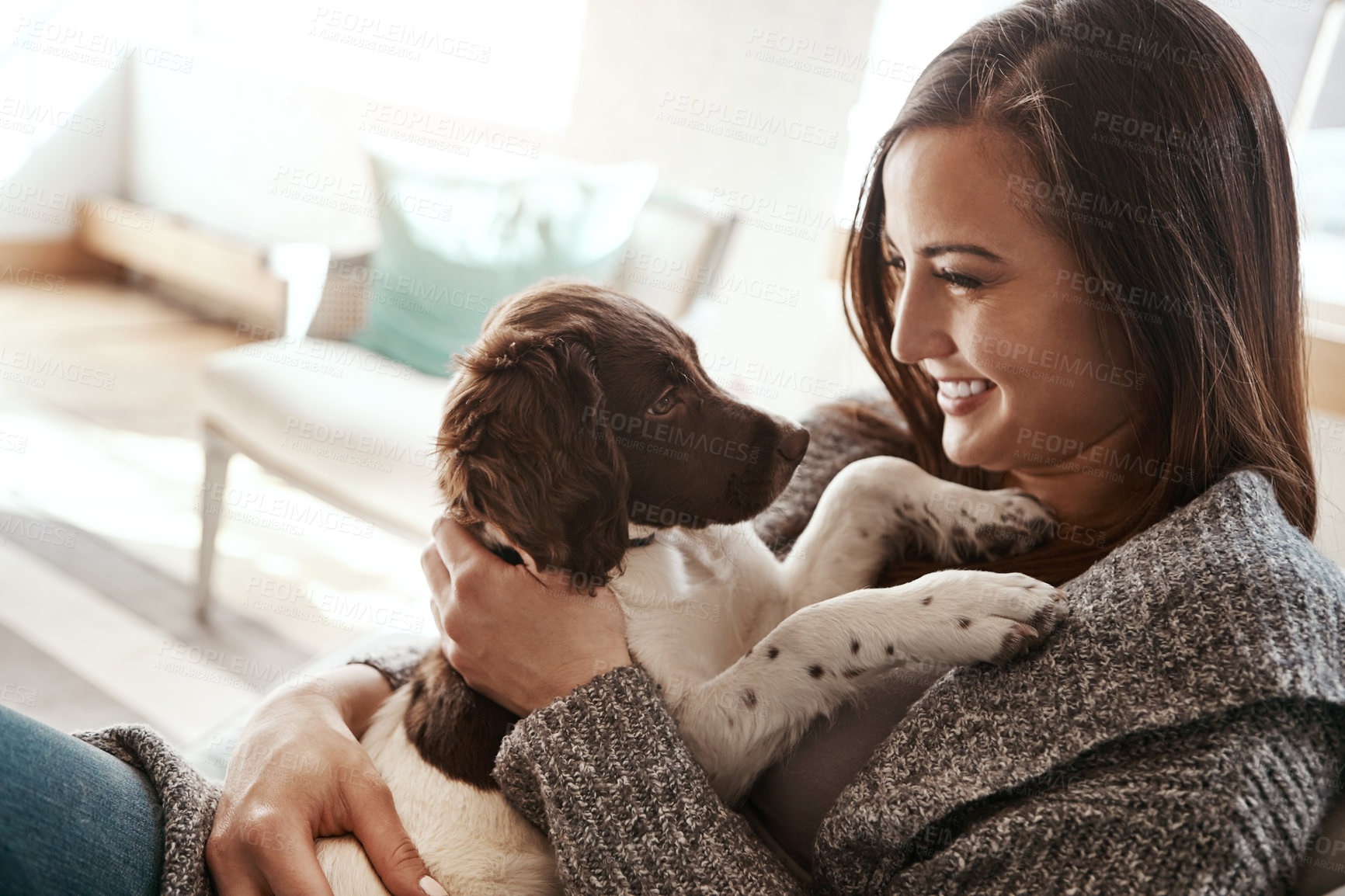 Buy stock photo Pet, smile and dog mom in a home on a living room couch with dog bonding with care. Animal love, puppy and person with happiness at home with a smile from animals on lounge sofa together feeling calm