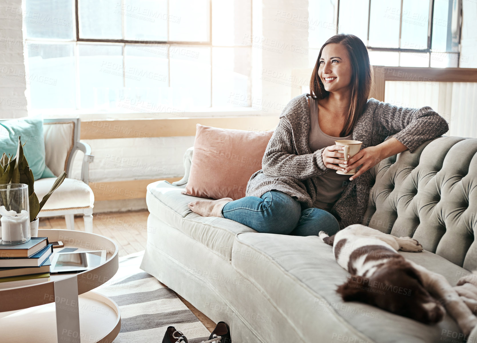 Buy stock photo Relax, morning tea and woman with dog on a home living room couch feeling calm with happy lifestyle. Happiness and smile of person with puppy thinking with coffee on peaceful lounge day in a house