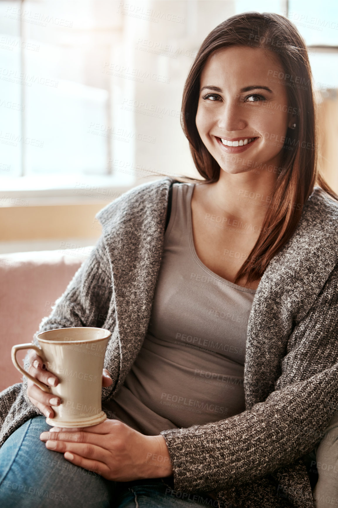 Buy stock photo Smile, woman and coffee portrait at home on a living room sofa feeling calm and relax. House, tea and morning happiness of a person with a drink on a house lounge couch peaceful and smiling alone