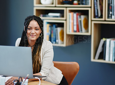 Buy stock photo Cropped portrait of an attractive young woman sitting in her home office