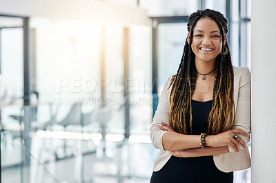 Buy stock photo Cropped portrait of an attractive young female designer standing with her arms crossed in the office