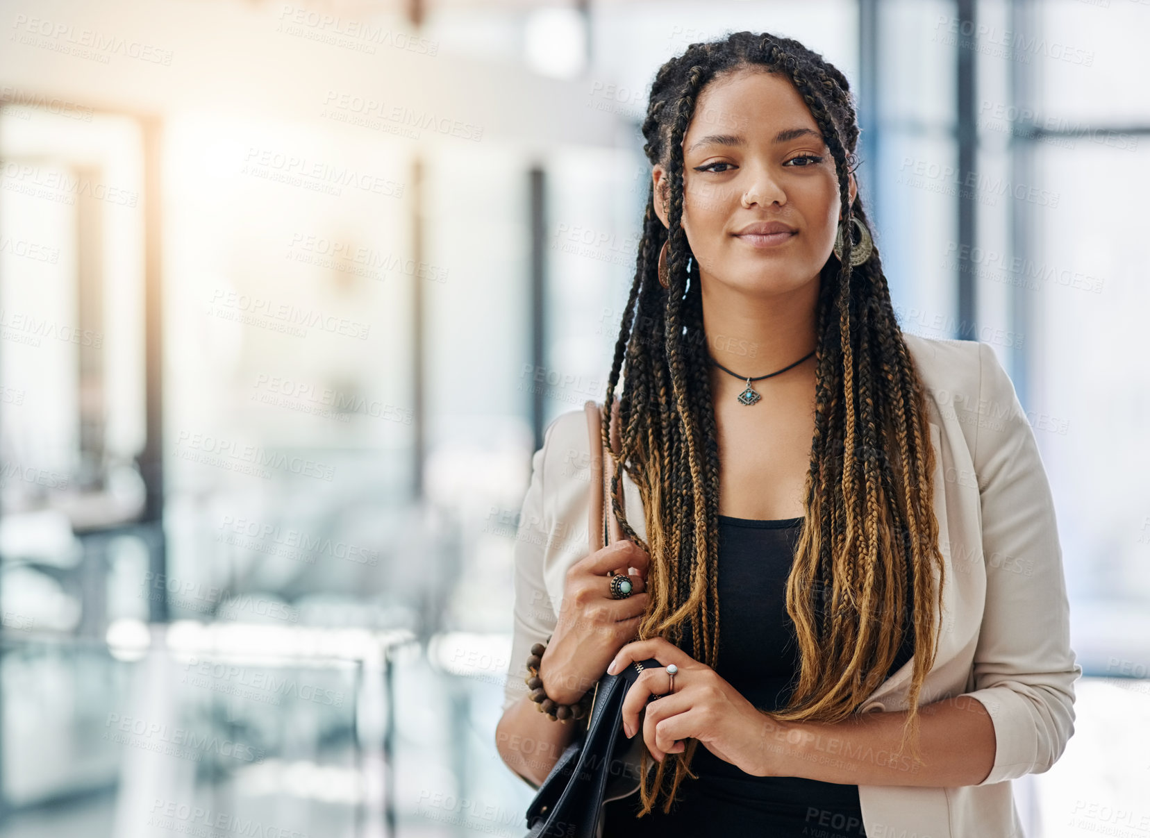 Buy stock photo Cropped portrait of an attractive young female designer standing in her office