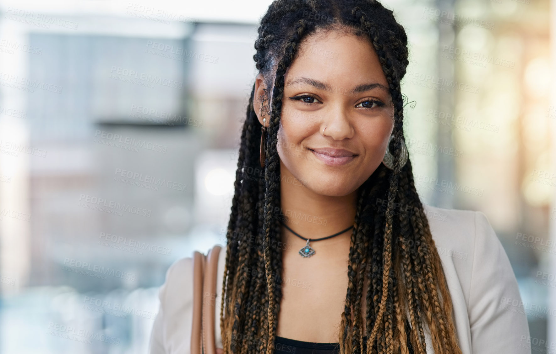 Buy stock photo Cropped portrait of an attractive young female designer standing in her office