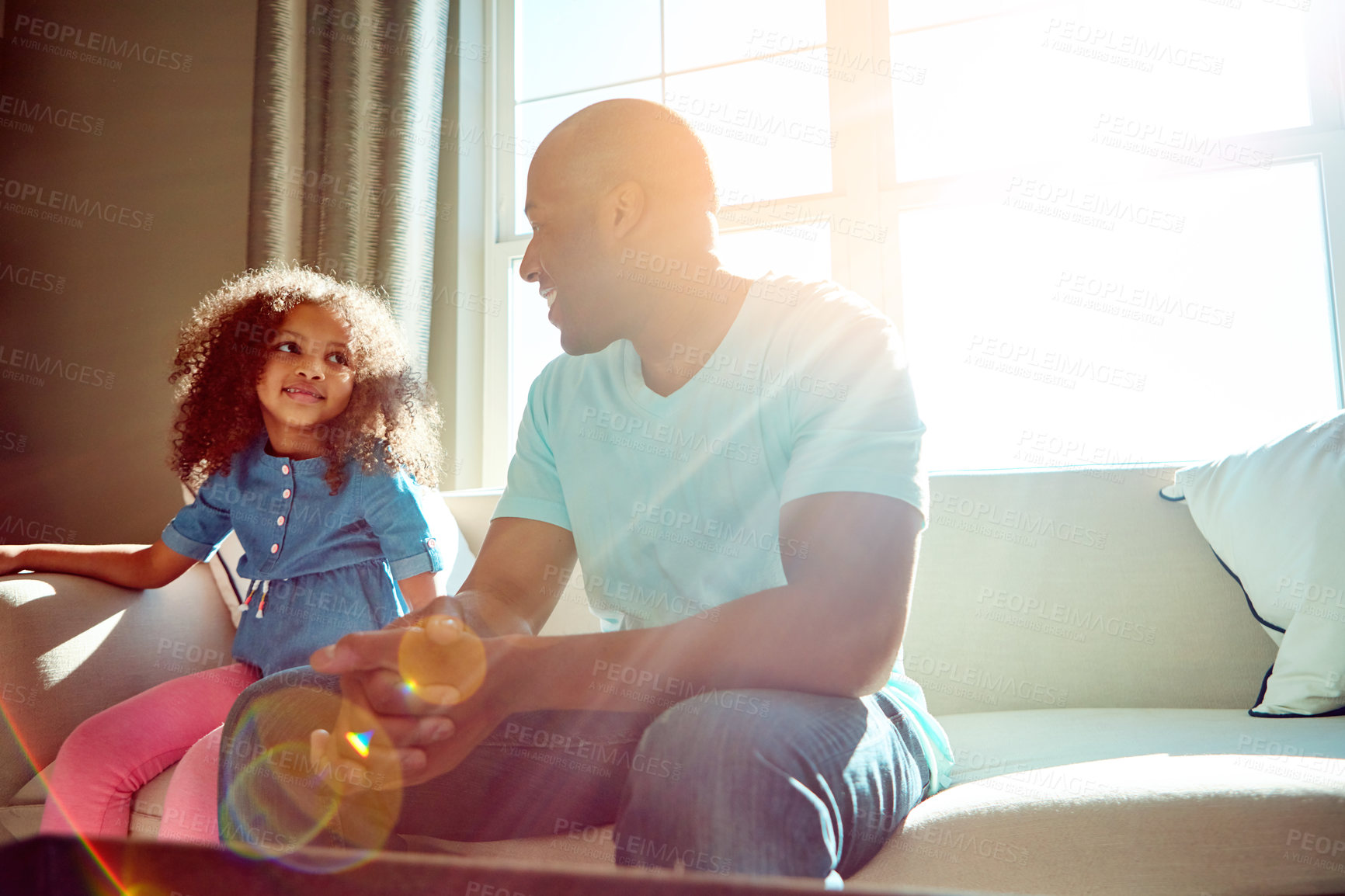 Buy stock photo Break, bonding or talking with father and daughter on sofa in living room of home for conversation. Advice, flare and space with single parent man speaking to girl child in apartment for development