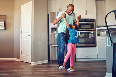 Buy stock photo Dance, balance and father with girl in home for bonding, relationship and fun together on weekend. Family, parenting and dad with child in kitchen for relax, playing and teaching dancer move to music