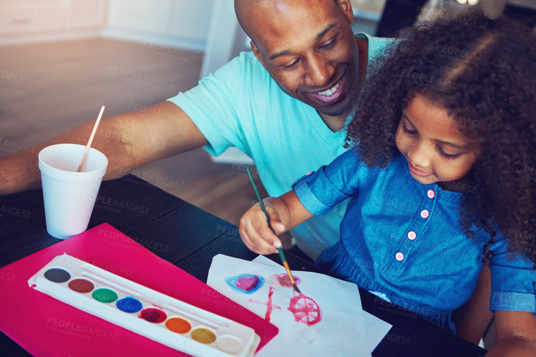 Buy stock photo Black dad, daughter and help with homework in home for education, learning and support with care. Parent, school work and happy on teaching for child development for project, art and creativity