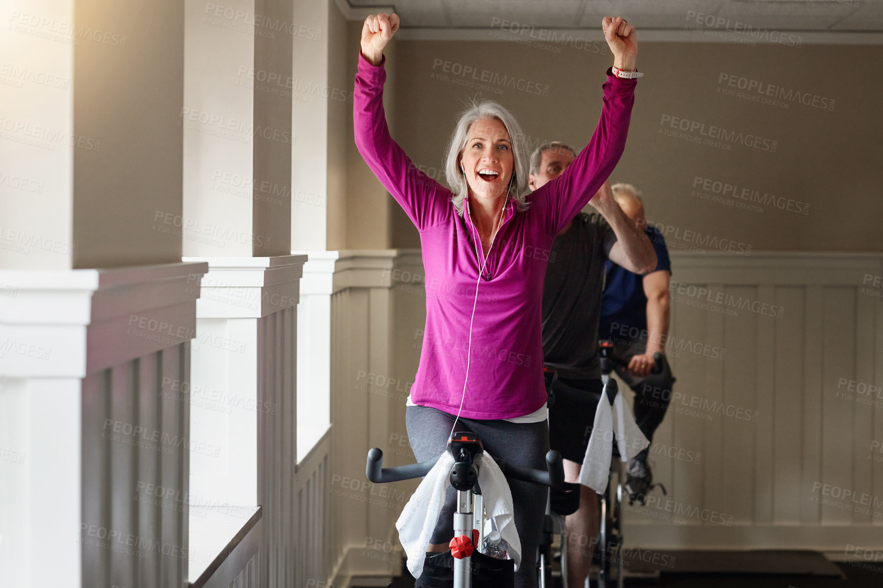 Buy stock photo Gym, success or happy woman on cycling bike in workout or cardio training for progress, health or wellness. Class, exercise or proud senior person on bicycle machine for fitness, challenge or goal