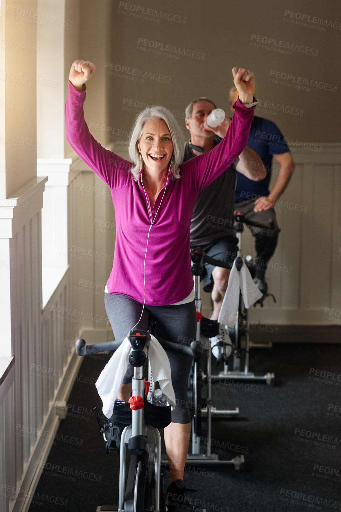 Buy stock photo Gym, winning or happy woman on cycling bike in workout or cardio training for progress, portrait or wellness. Class, exercise or excited senior person on bicycle machine for fitness, success and goal